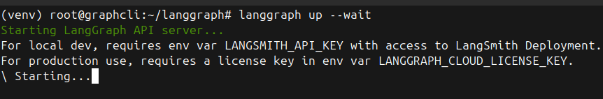 Терминал с процессом запуска API-сервера с помощью команды langgraph up --wait.